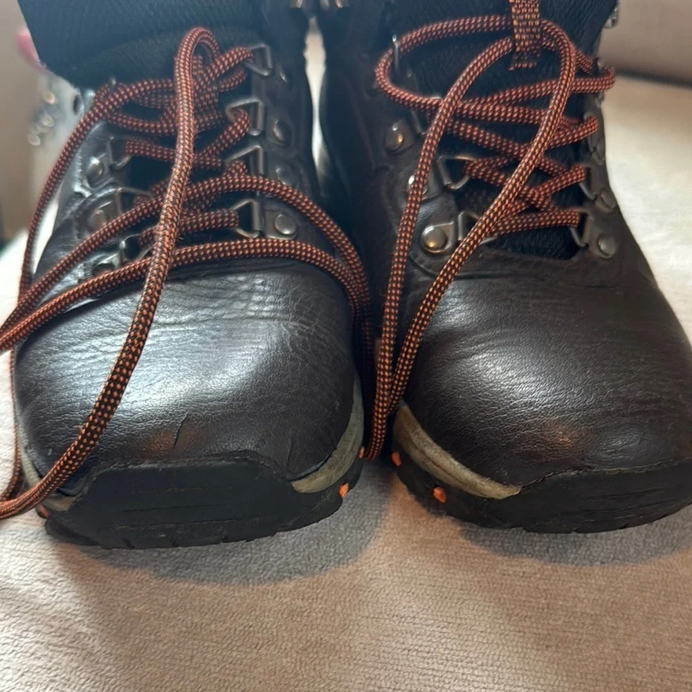 Rugged Black and Orange Boots for Outdoor Adventures